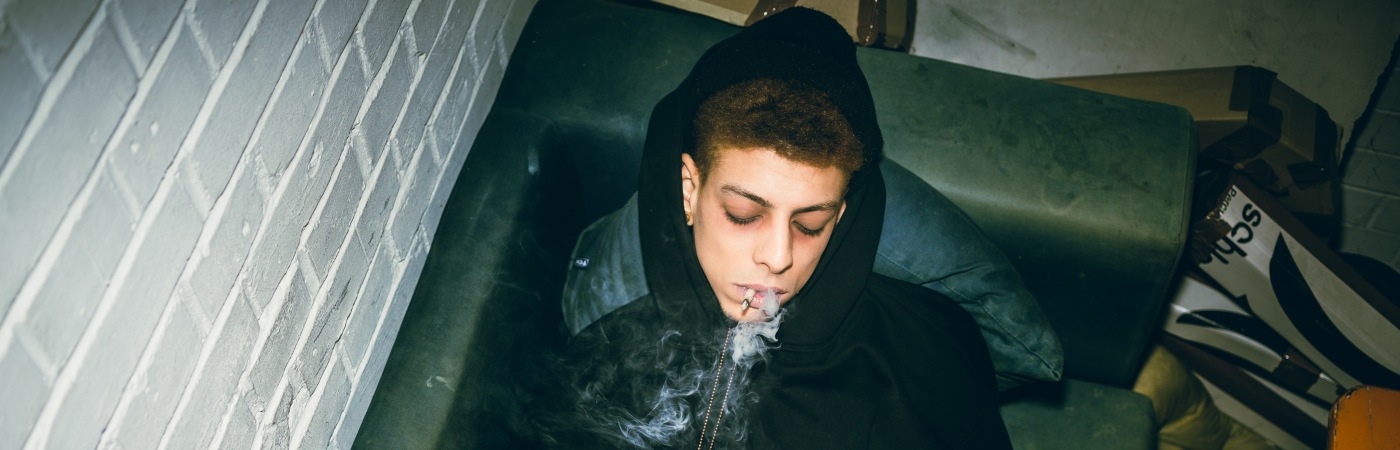 Teen smokes marijuana