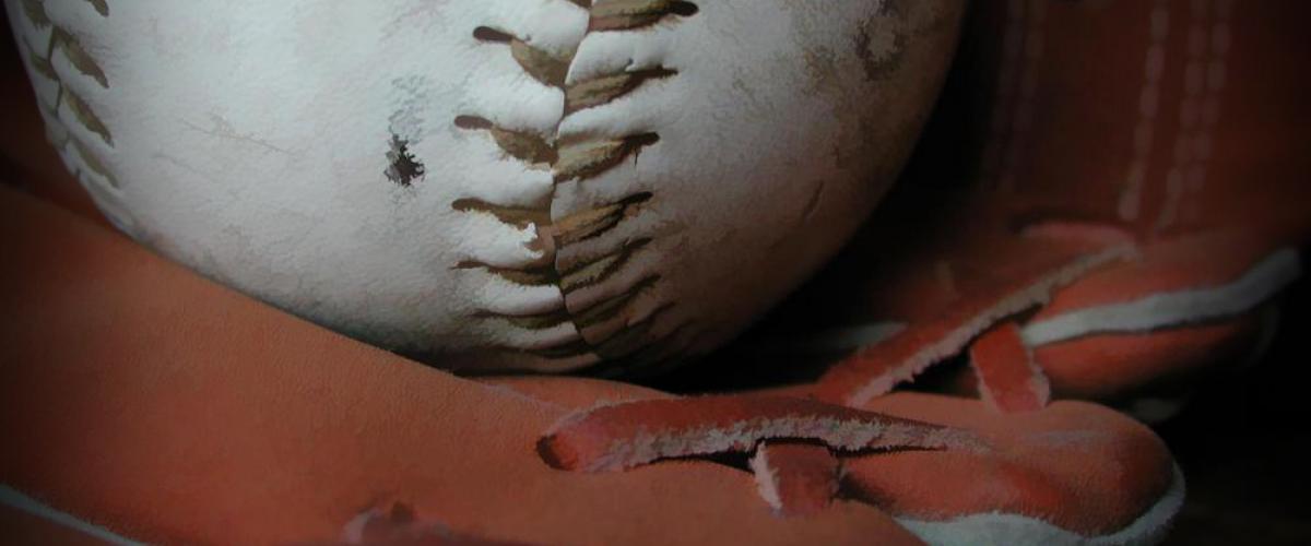 photo of baseball in glove