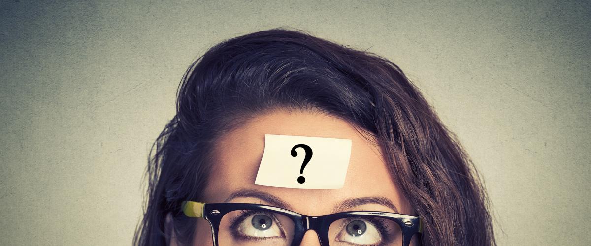 girl with question mark on forehead