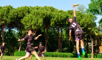 Teenagers playing frisbee