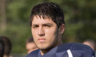 football player on sideline