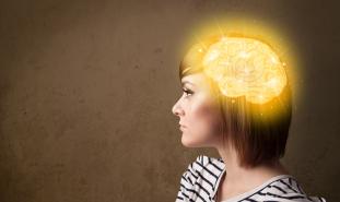 teen girl with brain illuminated